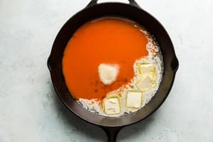 hot sauce and butter in a skillet
