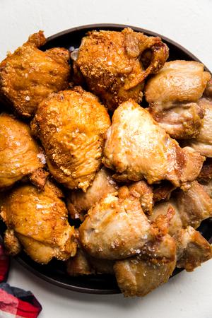 Boneless Skinless Crispy Chicken Thighs on a plate