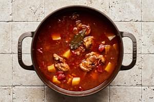 onion, garlic, tomatoes, potatoes, chicken stock, bbq sauce, Worcestershire, brown sugar, spices and chicken thighs in a pot