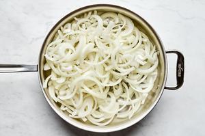 Onions slowly caramelizing in butter and oil.