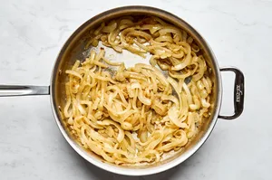 Onions slowly caramelizing in butter and oil.