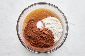 ingredients in a bowl to make classic fudgy brownies, a rich chocolatey dessert
