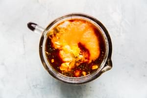 ingredients for cocktail sauce is a glass liquid measuring cup