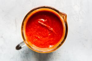 homemade cocktail sauce in a glass liquid measuring cup