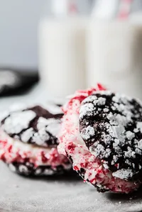 chocolate Crinkle Cookies With Peppermint Cream and candy cane pieces