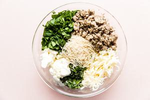 ingredients for stuffed pasta shells ground chicken, spinach, mozzarella cheese, ricotta, parmesan