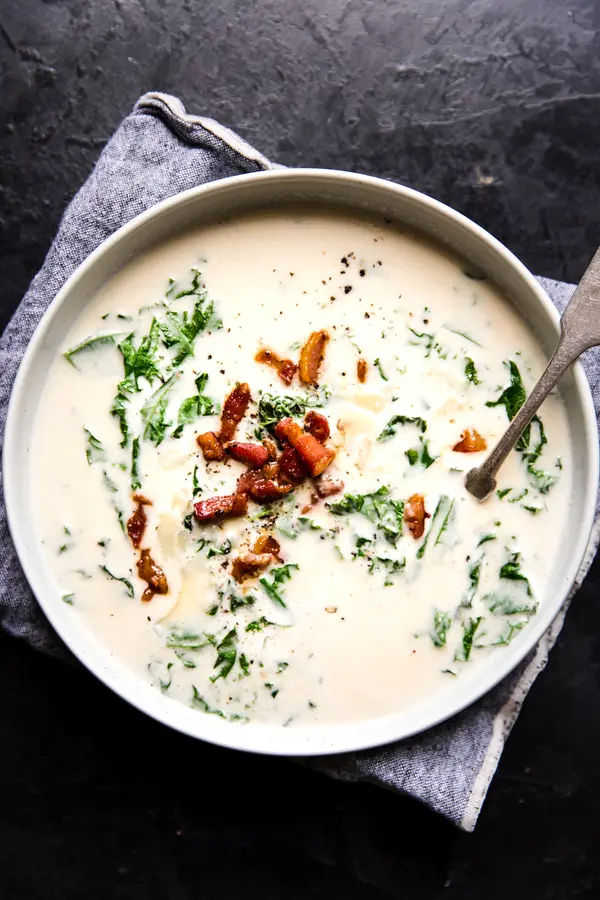 garlic soup in a bowl with a spoon