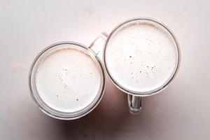 2 mugs of hot buttered rum.