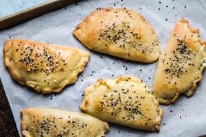 baked Keto Homemade Ham And Cheese Hot Pockets on a baking sheet