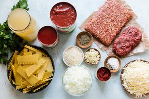 ingredients for lasagna soup italian sausage, ground beef, canned tomatoes, chicken stock, lasagna noodles, onto, garlic