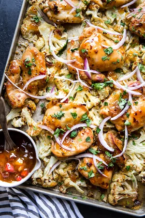 Mango Chutney Sheet Pan Chicken With Cauliflower with red onions