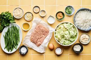 ground chicken, green beans, cabbage, buttermilk, mayo, sour cream, cilantro, miso, spices, panko and egg in prep bowls