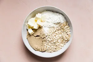 butter, brown sugar, flour, oats and salt in a bowl for berry crisp topping