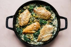 one-pot chicken with creamed kale made with parmesan, heavy cream, whole grain mustard with  Castelvetrano  olives