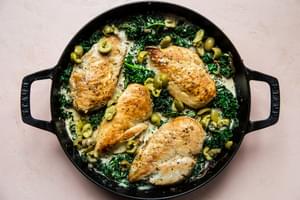 one-pot chicken with creamed kale made with parmesan, heavy cream, whole grain mustard with  Castelvetrano  olives