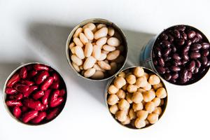 a can of kidney beans, a can of chickpeas, a can of black beans and a can of navy beans