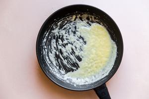 making a cream pasta sauce in a pan
