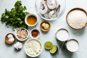 ingredients for red curry risotto with shrimp in small bowls