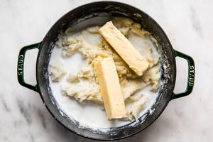 pot of garlic roasted mashed potatoes with whole milk and 2 sticks of butter