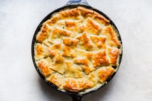 golden brown homemade Chicken Pot Pie in a cast iron pan