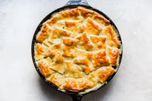 golden brown homemade Chicken Pot Pie in a cast iron pan