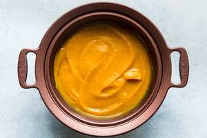butternut squash soup with apples pureed in a slow cooker