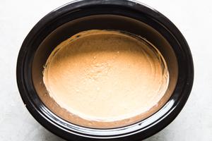 crock pot with coconut milk and red curry
