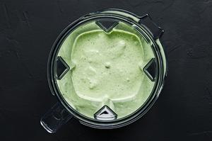 fresh herb sauce in a blender made with fresh Basil leaves, cilantro, green onions, garlic, mayonnaise, lemon juice and salt