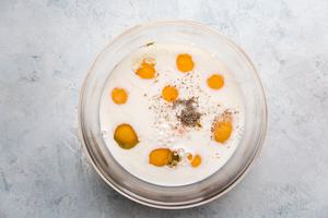 eggs, milk, salt and pepper in a bowl to make egg cups