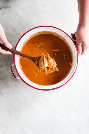 white enamel pot of whole 30 approved tikka masala soup