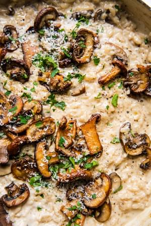 a pot of wild mushroom risotto made with shallots, garlic, thyme, salt and pepper