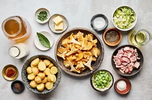 ingredients laid out to make rich & creamy wild mushroom chowder with bacon, potatoes & leeks. A cozy & comforting fall meal