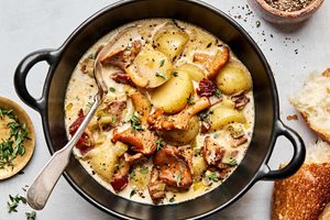 A bowl of rich & creamy wild mushroom chowder with bacon, potatoes & leeks. A cozy & comforting fall meal