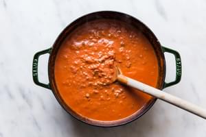 Tomato sauce with cream and parmesan cheese and kale