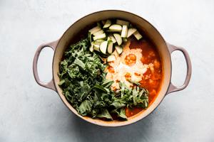 tomato soup with cream and cauliflower , zucchini and kale