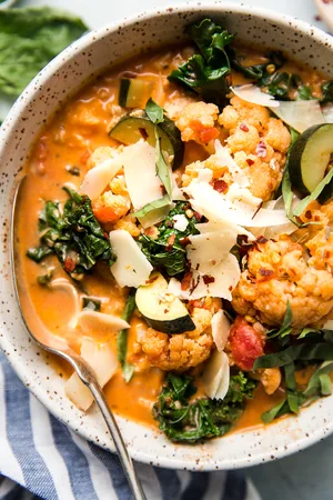 Low carb creamy tomato soup with mixed vegetables and Italian chicken sausage