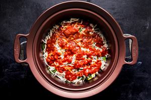 tomato sauce and cheese layered into a crockpot