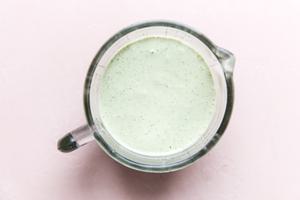 tahini dressing in a small glass jar