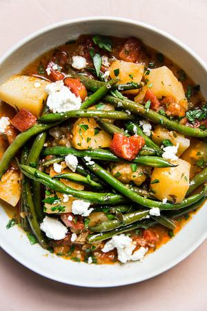 Fasolakia Greek Green Beans with potatoes, tomatoes, and feta