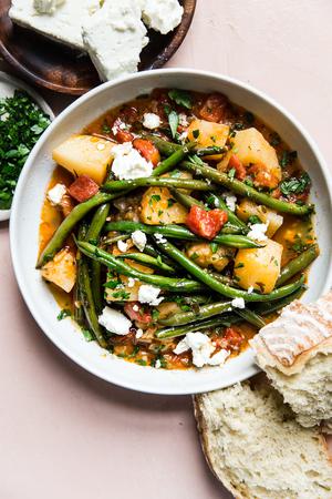 Fasolakia Greek Green Beans with bread, potatoes and tomatoes