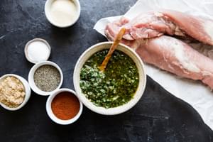 ingredients laid out pork tenderloin chimichurri, paprika, garlic powder, brown sugar