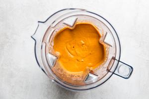vitamix blender filled with blended romesco sauce