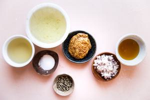 ingredients laid out stone ground mustard, honey, shallots, salt, pepper, rice vinegar and light tasting olive oil