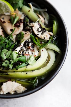 large bowl of Asian inspired leftover turkey soup with rice noodles