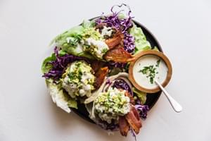 A platter of Low Carb Bacon Burger With Jalapeño Mayo in a small bowl with a spoon
