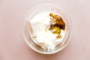 cream cheese, mayo and heavy cream, curry powder, salt and bouillon in a bowl