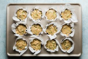 zucchini muffin batter in a muffin tin