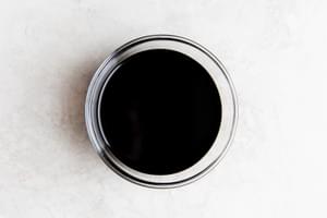 A glass bowl of balsamic vinegar