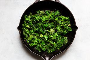 Sautéed kale in a cast iron skillet