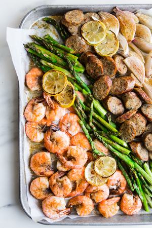 low carb sheet pan dinner with shrimp, asparagus, sausage and shallots